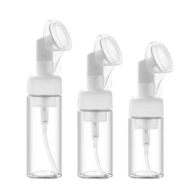 Bouteille en mousse avec brosse en silicone plastique et fonctionnalité hybride pour un massage doux et une application cosmétique hygiénique
