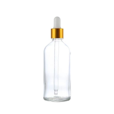 Vente à chaud bouteille vide en verre d'huile essentielle et gouttière avec jupe en aluminium or/argent