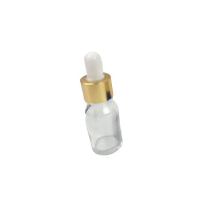 Bouteille d'huile essentielle en verre clair avec gouttelier en aluminium