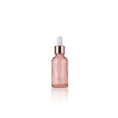 Bouteille essentielle en verre rose en gros avec bouchon de gouttelette en aluminium doré