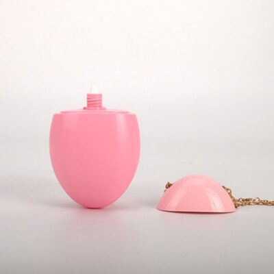 Bouteille de protection solaire de style œuf de 50 ml, avec chaîne dorée amovible et design personnalisable pour emballage cosmétique